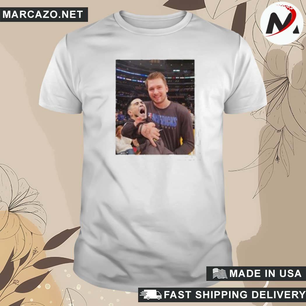 Official Juju Luka Doncic Carrys Devin Booker Baby Nocontextees Luka Doncic Carrying Devin Booker Crying Baby Picture T-Shirt